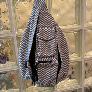 Multiple compartment sling Crossbody bag